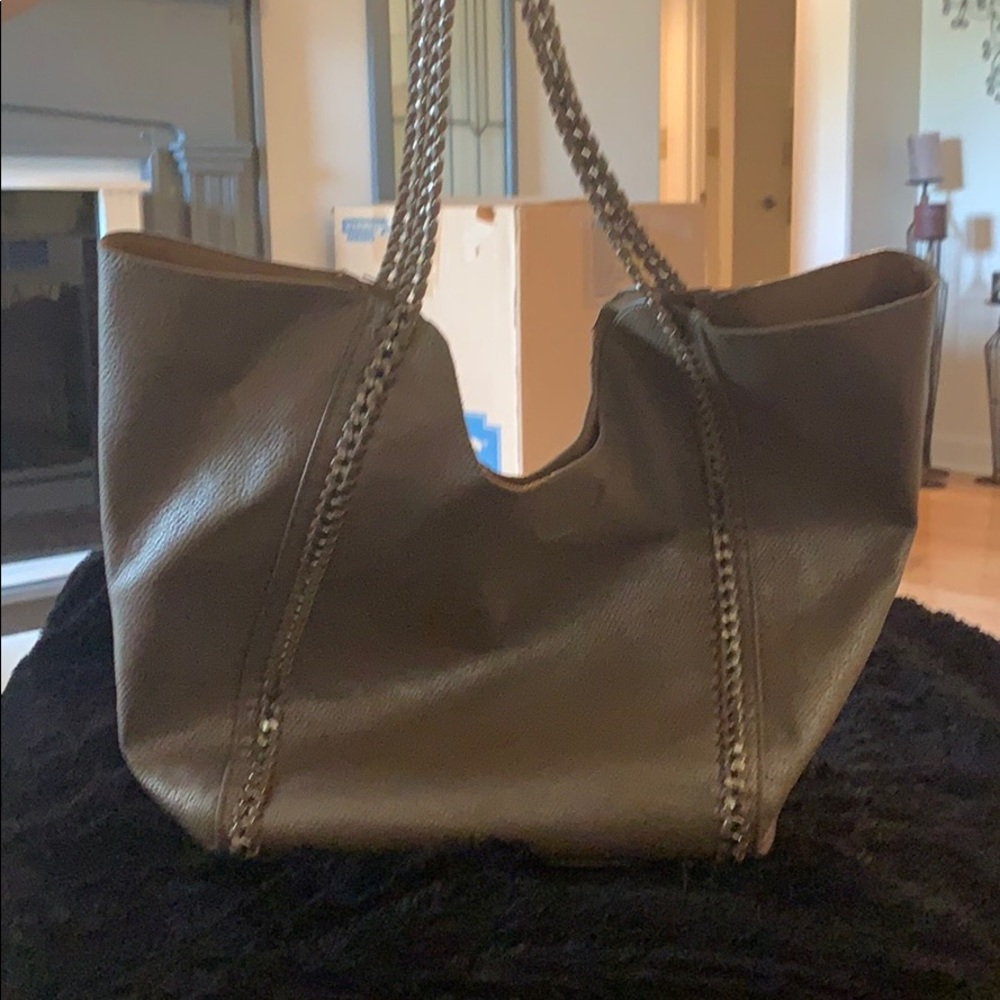 Distressed silver shoulder bag with travel bag